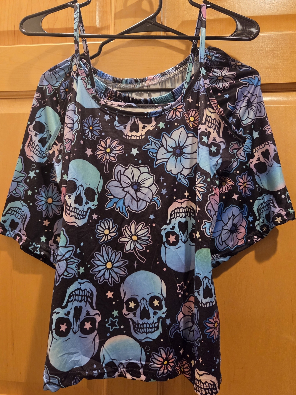 Love Black Cold-Shoulder Skull & Floral Tunic in Pastel Blue and Pink